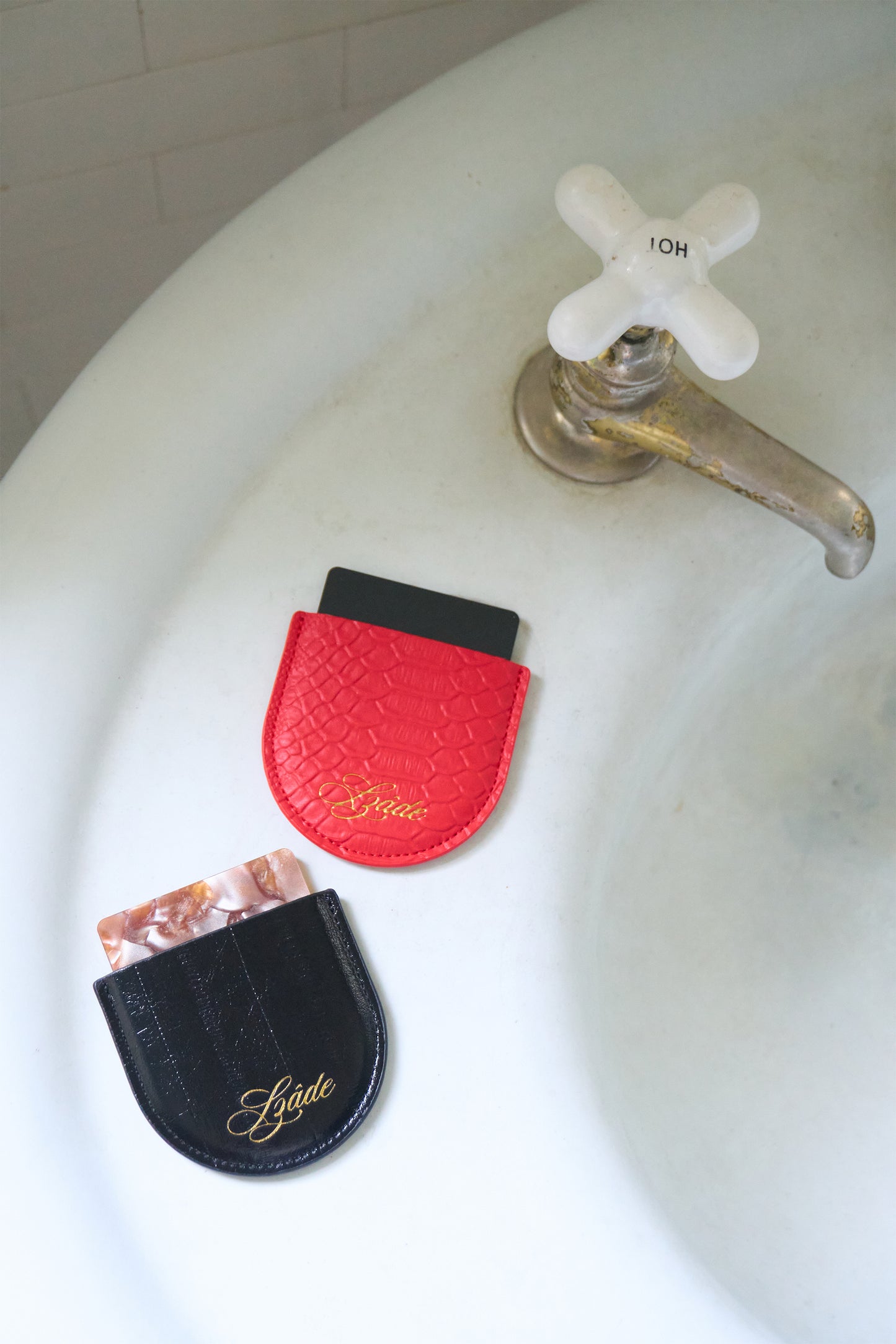 SZADE - the compact ; red snake skin
