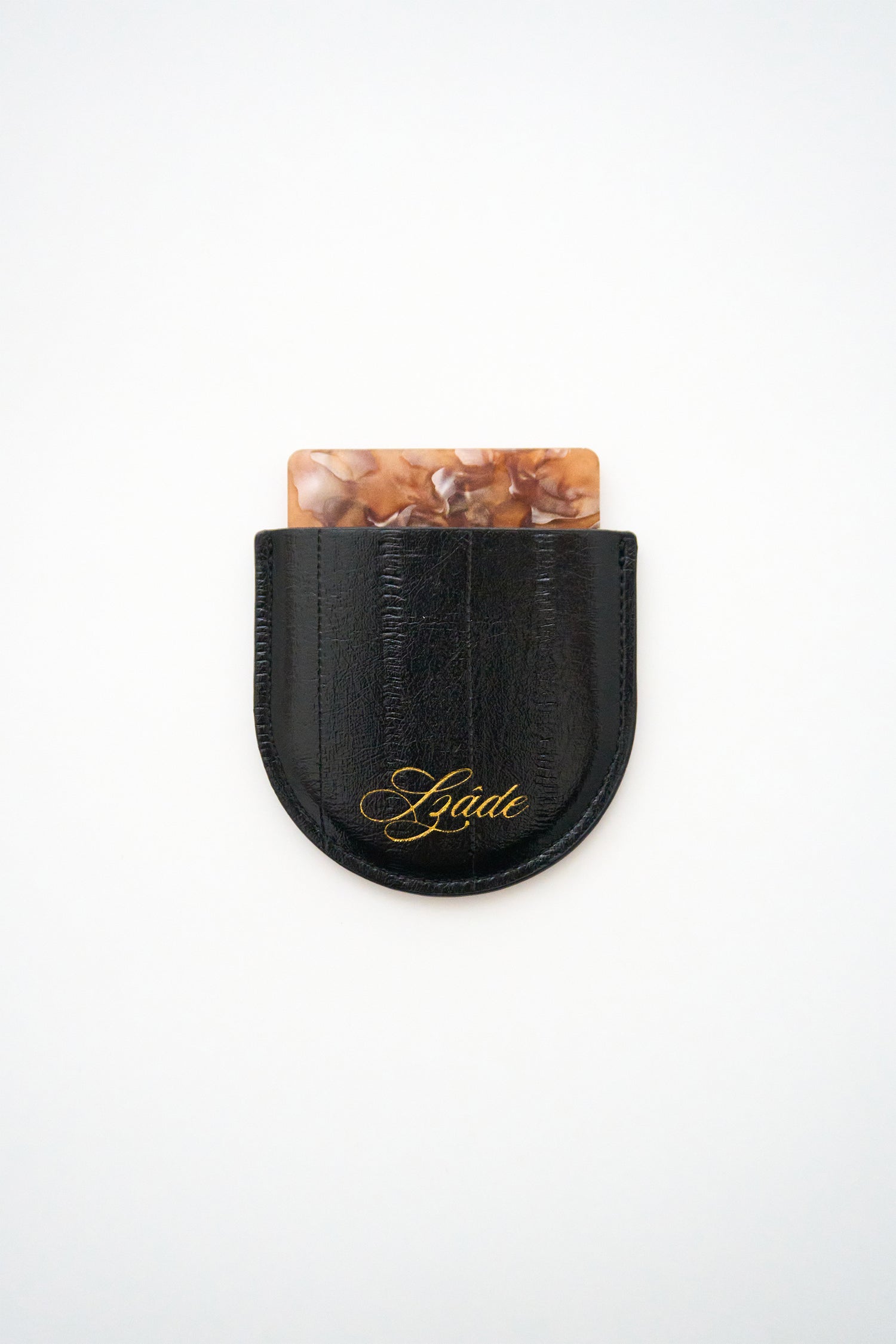 SZADE - the compact ; black eel